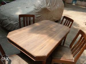 Sell Sunmica dining table with four chair in good