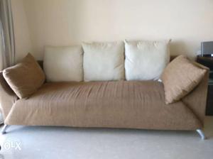 Sofa set with cushions and covers