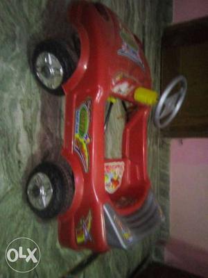 Toddler's Red BMW Ride-on Toy Car
