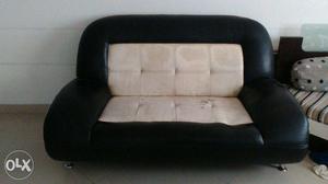 Tufted Black And White Leather Sofa very comfort really.