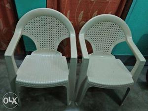 Two Grey Monobloc Chairs