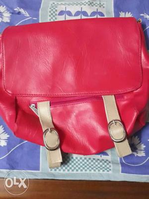 Unused pink side bag. Totally new.