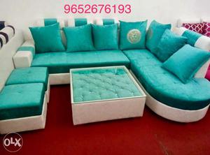 White And Teal Sectional Sofa With Ottoman