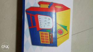 Yellow, Red, And Blue Tent Toy Box