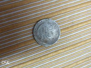 25 paise coin.  years.. 50 years old..