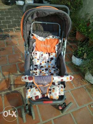 Baby's Black And Orange Polka-dot Stroller
