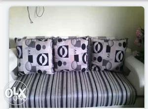 Black And Gray Couch With Three Throw Pillows