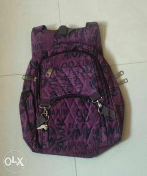 Black And Purple Quilted Backpack