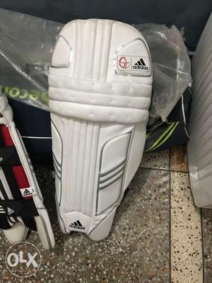Brand new 2 pairs of White Adidas Batting Pad