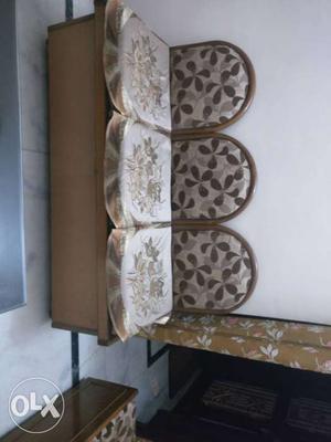 Brown And White Floral Padded Couch