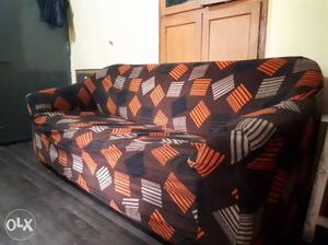 Brown, Black, Orange And Gray Couch