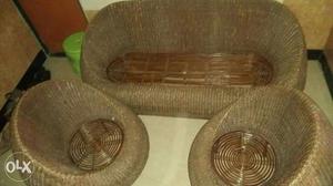 Brown Wicker Bench And Two Chairs