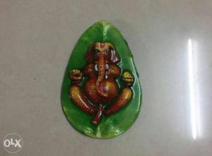 Green And Brown Ganesha Ceramic Figurine