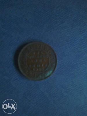Indian  currency one quarter Anna and 