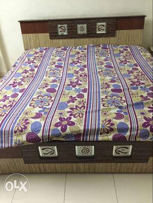 King size bed with matress & good storage capacity