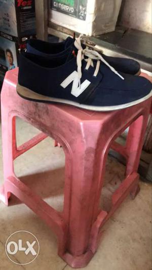 Pair Of Blue-and-white New Balance Low-top Sneakers