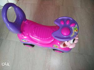 Pink And Purple Plastic Ride-on Toy