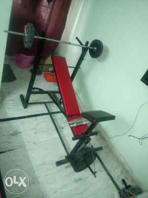Red And Black Incline Bench Press With Barbel