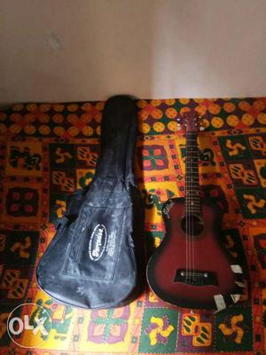 Red Burst Acoustic Guitar With Black Soft Case