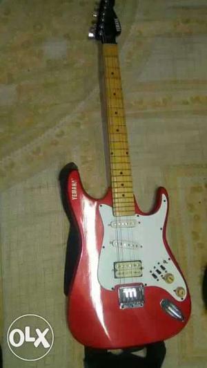 Red Stratocaster-style Electric Guitar
