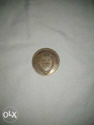 Round Gold Half Anna Coin