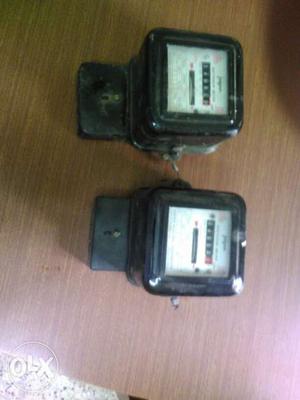 Two Black-and-white Electric Meters