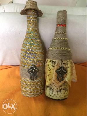 Two Brown-and-yellow Decorative Bottles