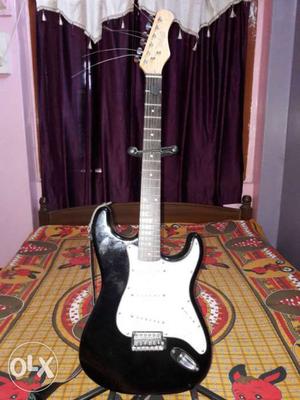 White And Black Stratocaster-style Electric Guitar