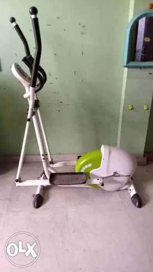 White And Green Elliptical Trainer