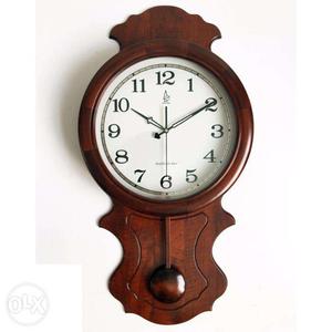Wooden handmade pendulum clocks
