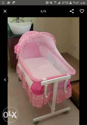 1 year used cradle.. with bed and mosquito net
