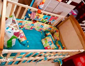 Branded Wooden Crib with matresses and runner