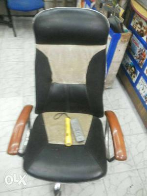Brown And Black Leather Rolling Chair