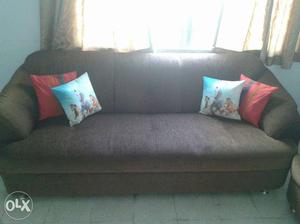 Brown Fabric Sofa With Throw Pillows
