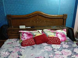 Brown wooden bed
