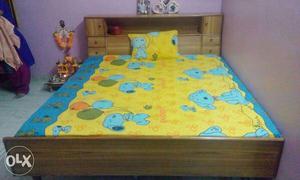 Double bed with box back side and with this bed
