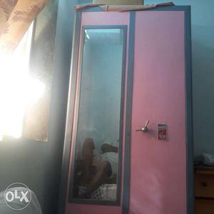 Pink And Gray Wooden Cabinet With Mirror