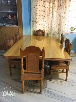 Solid wood 6 seater dining table. Chairs have