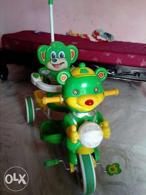 Toddler's Green And Yellow Plastic Ride On Toy