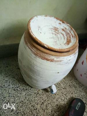 White And Brown Clay Dispenser