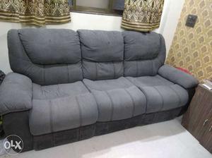 3 seater sofa with 2 good working recliners. only