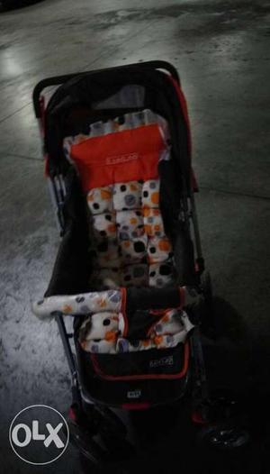 Baby's Black And Red Printed Stroller