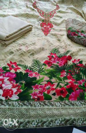 Beige, Pink, And Green Floral Textile