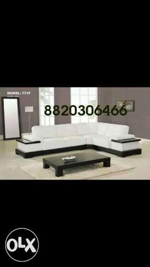Black And White Leather Sectional Couch With Brown Wooden