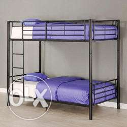 Black Steel Bunk Bed With Purple And White Bed Set