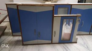 Blue, White, And Brown Wooden 2-door Cabinet