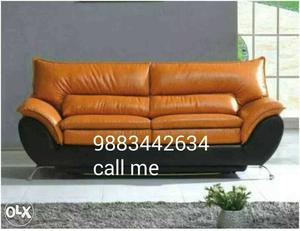 Brown And Black Leather 2-seat Couch