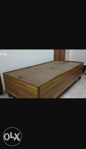 Brown Wooden Bed