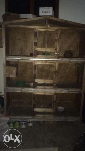 Cage with three racks and seperate cleaning plates
