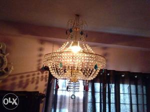 Gold-colored And Crystal Clear Chandelier